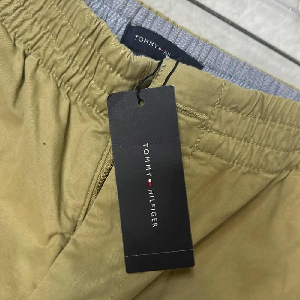 NWT .SIZE-M..97%COTTON..TOMMY-HILFIGER—Tan Flat Front Shorts - Picture 2 of 13